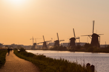 Line of Romantic and Traditional Dutch Windmills in Kinderdijk Village in the Netherlands.