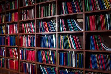 Clinic registration books on the shelf.