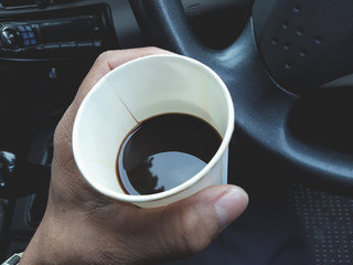 black coffee hot drink in paper cup