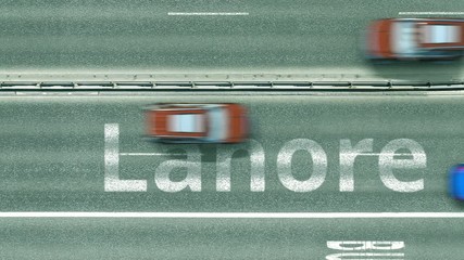 Top down view of the highway with revealing Lahore text. Driving in Pakistan intro clip