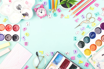 School or office supplies on a desk with copy space.