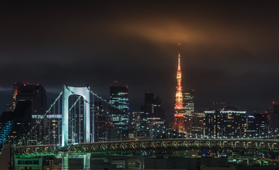 Panoramic modern city skyline bird eye aerial view of Tokyo bay under rainy night