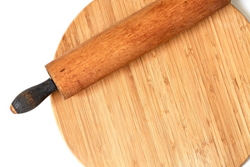 Wooden Rolling Pin on a Cutting Board