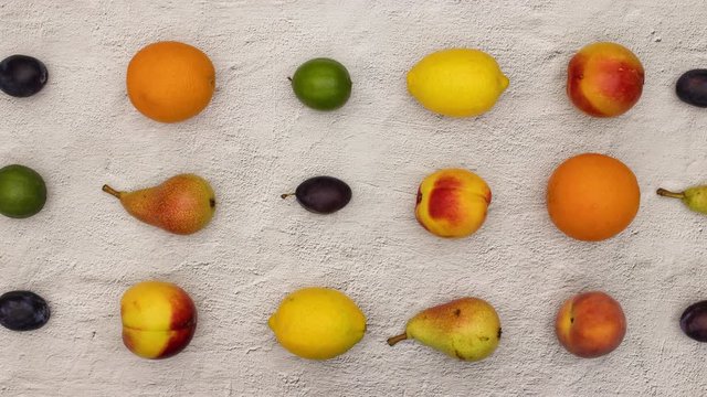 Stop motion animation of moving fresh fruits. Looping stop motion animation 