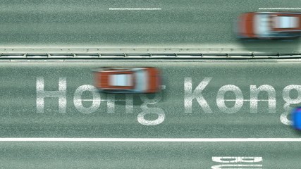 Top down view of the highway with revealing Hong Kong text. Driving to China intro clip