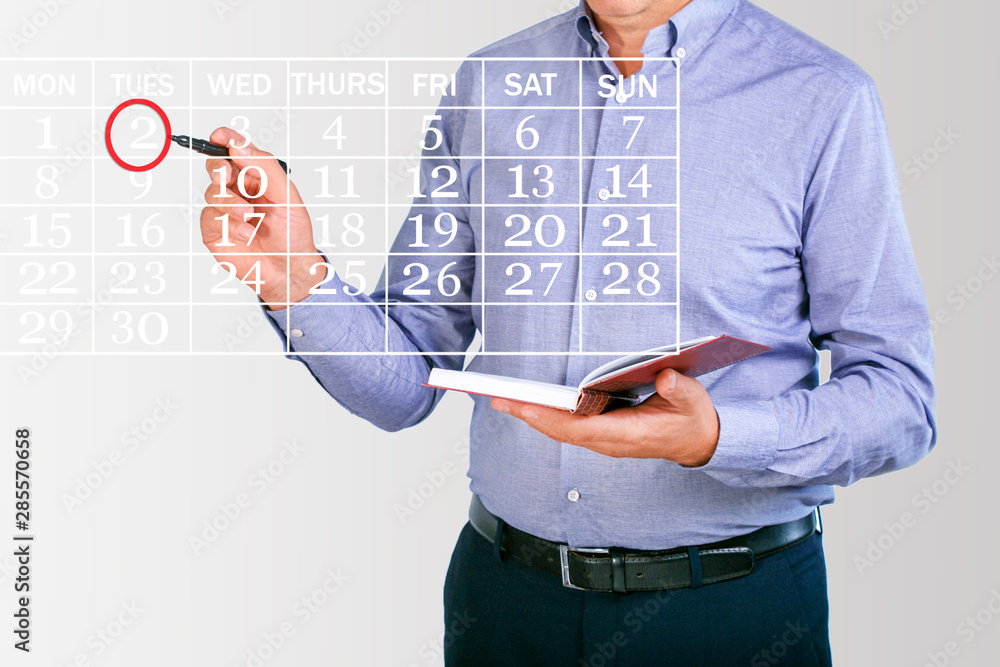 Wall mural businessman planning business schedule with notepad. time management and organizing skill. concept i