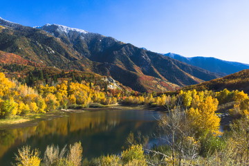 Lower Bells Canyon Reservoir and Wasatch Mountains from a nearby hill - Sandy, Utah - obrazy, fototapety, plakaty