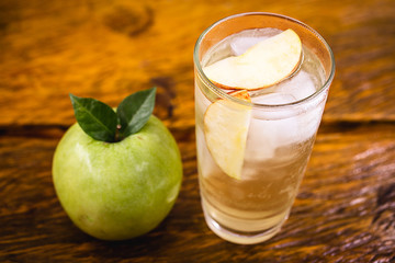 Homemade green apple soda. Refreshing drink, apple juice with carbonated water.