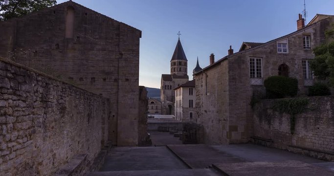 The sun rise over the 1000 years old Cluny abbey, with a nice clear sky