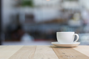 Hot Coffee cup  on the wooden table