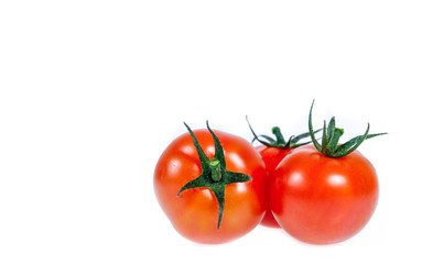 Copy space .Tomatoes isolated on white