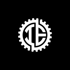 Naklejka premium Initial letter I and E, IE, interlock cogwheel gear monogram logo, white color on black background