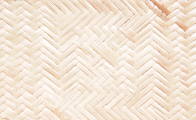 Rattan wood mat in interlace seamless shaped patterns for texture or light brown background top view
