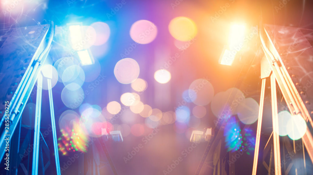 Poster background image of stage in color lights