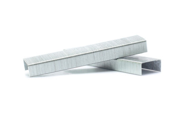 metal staple concept over white background