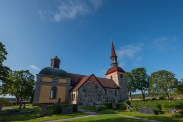 Fototapeta na wymiar A morning view of the Lovö church at Drottningholm in Stockholm