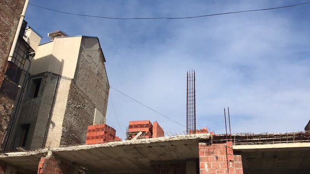 Raw footage of construction site of an old building