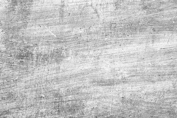 Texture of a concrete wall with cracks and scratches which can be used as a background