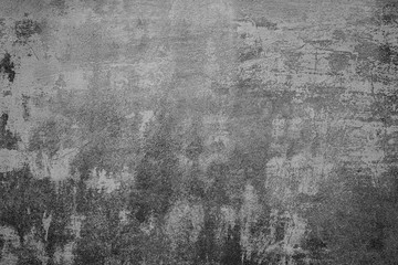 Texture of a concrete wall with cracks and scratches which can be used as a background