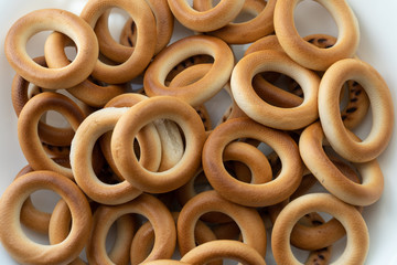 Sushki - traditional Eastern European bread rings. Close up at white background