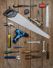 old instruments constructor or renovation for build and repair house on wooden background