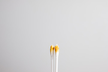 earwax on the wood spins the ears and earwax on the stick, both ears on the left side, right side