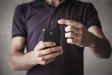 Man using smartphone. Technology, Contact