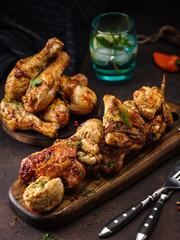 Grilled fried chicken meat. Grilled chicken legs and wings.