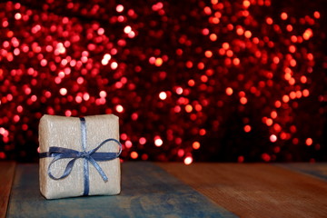 many beautiful colorful gifts on a shiny background