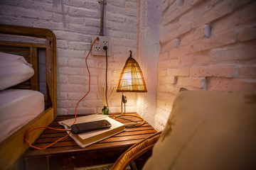 The background of living room decoration, small lamps for reading near the bed, can be turned off...