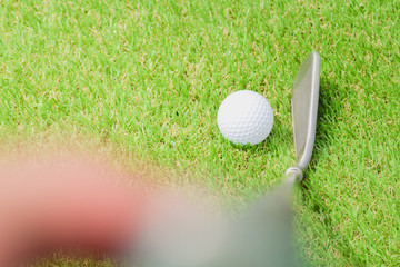 Golf ball on green for tee-off