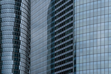 Fototapeta na wymiar Detail of a modern glazed office buildingArchitecture of a large residential building