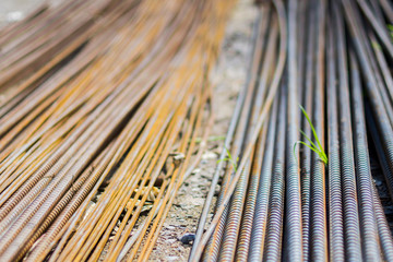 stack of straight old rusty high yield stress deformed reinforcement steel or iron...