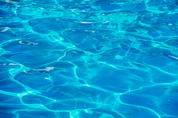 water in swimming pool rippled water detail background