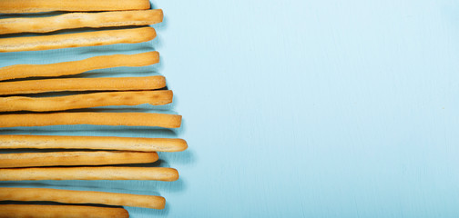 Fried bread stick on white background, flat lay