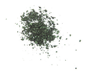 Green eye shadow crushed cosmetic. Isolated on background
