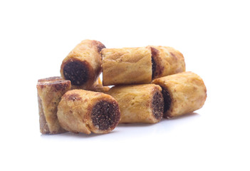 sweet dessert chocolate biscuit roll isolated on white background