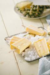Homemade popsicles made of pineapple