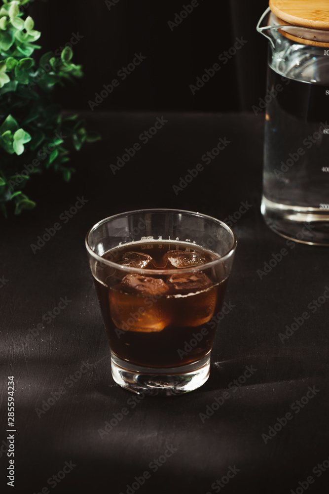 Wall mural iced coffee or cold brew coffee in a glass