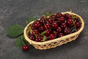 Sweet ripe cherry with leaves