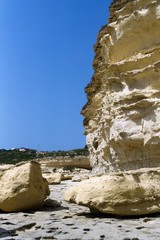 Yellow limestone cliffs on the coast of Malta.