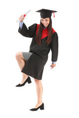 Female graduate with diploma on white background