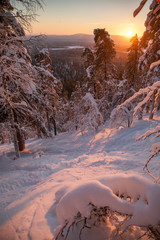 Winter mountains panorama with ski slopes and ski lifts near Vogel ski center, Slovenia