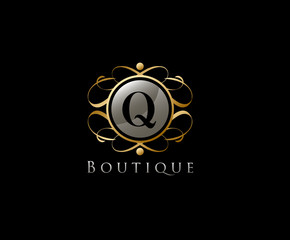 Royal Boutique Letter Q Logo Icon in Gold Color.