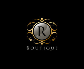 Royal Boutique Letter R Logo Icon in Gold Color.