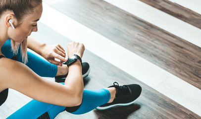 Results, not promises. Fitness girl having a rest after training. Copy space on the right side