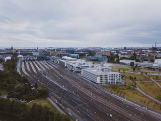 Obraz premium Train tracks leading to Helsinki Central Railway Station. July 2019.