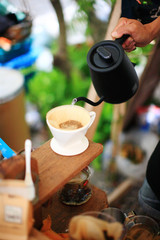 making drip coffee by paper filter