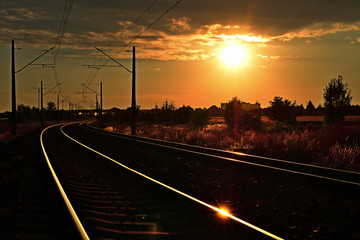 railroad tracks at sunset