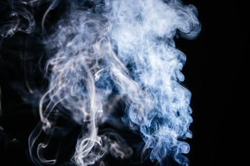 Blue smoke waves on black background